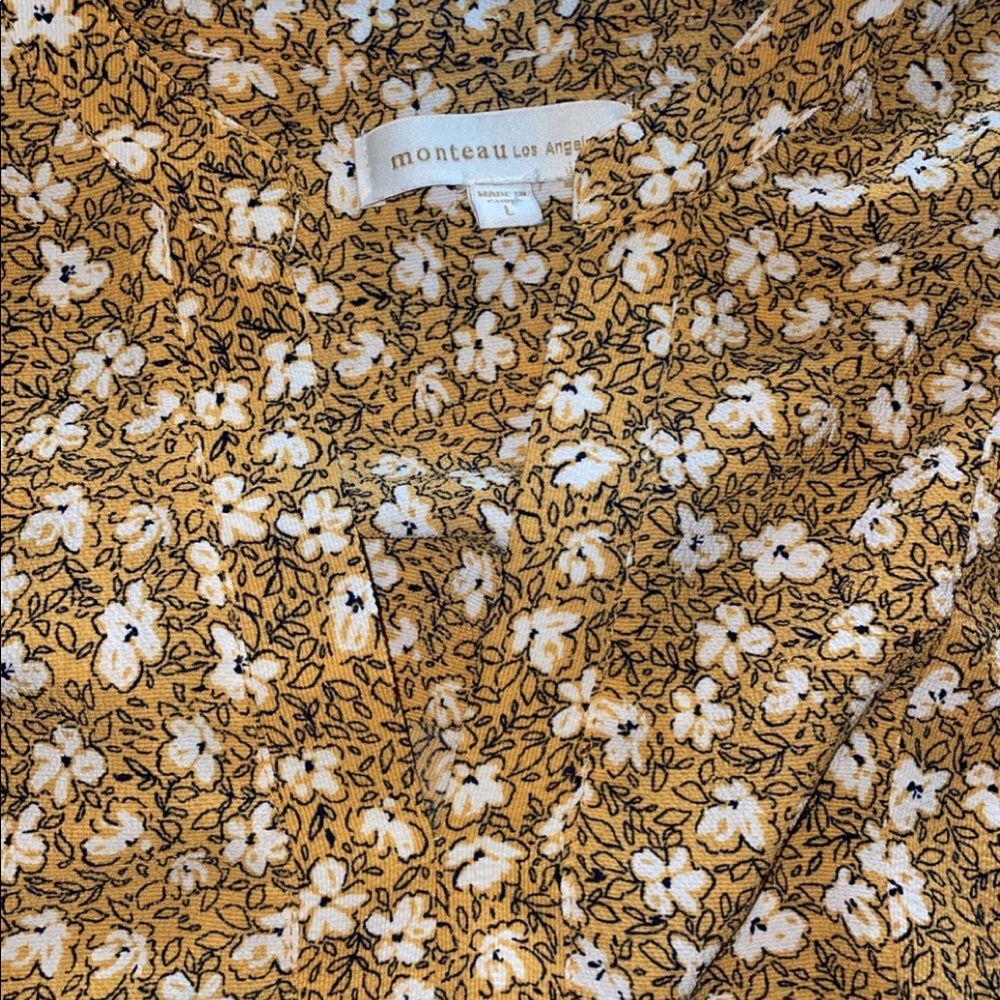 Yellow floral dress.rough texture.on the short side.ties in back